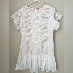 White dress with a light pink undertone